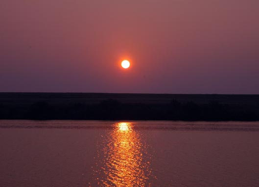 Sunset view by pond at McKnight Ranch